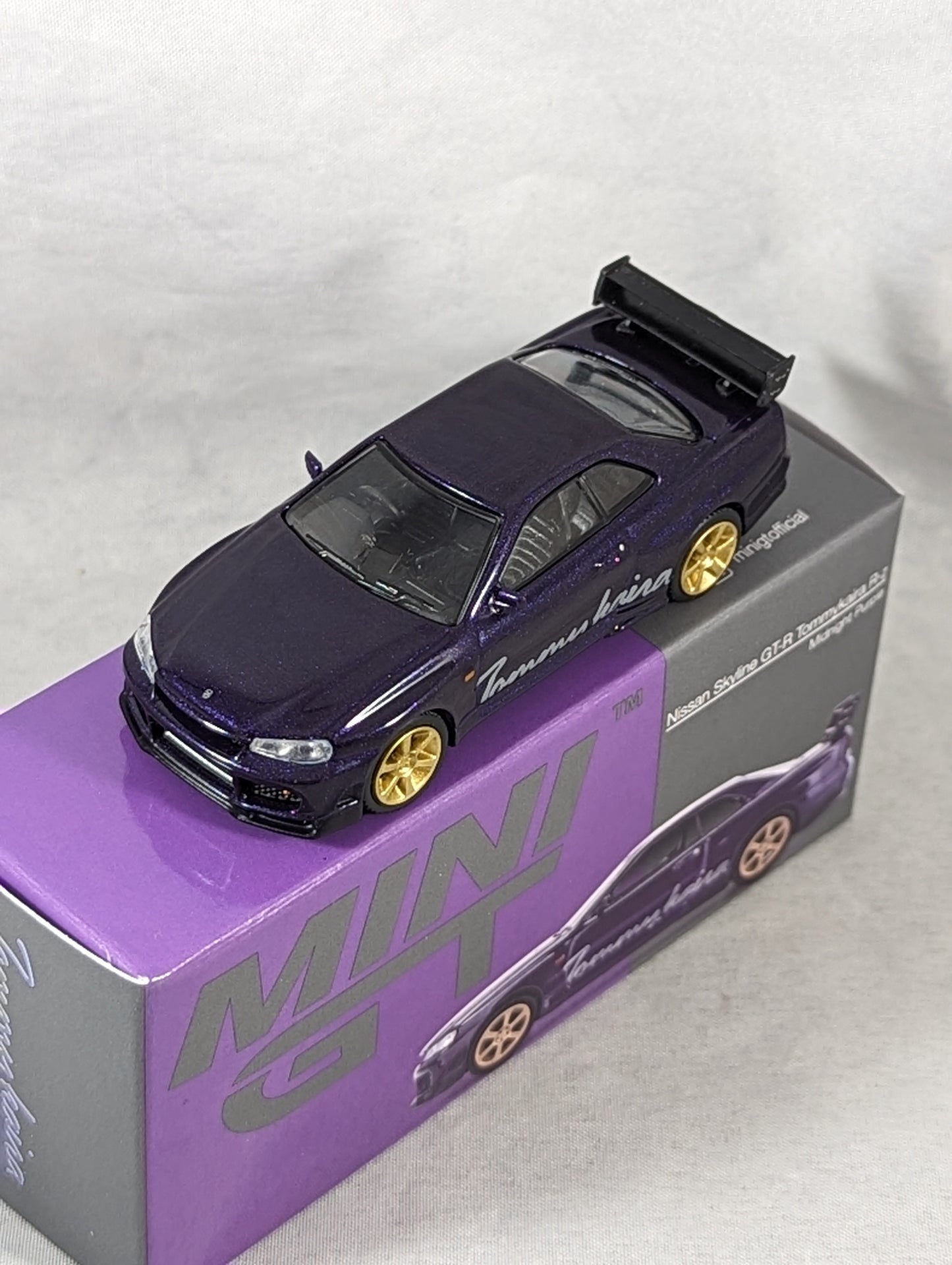 Mini GT Nissan Skyline GT-R R34 Tommykaira R-z Midnight Purple