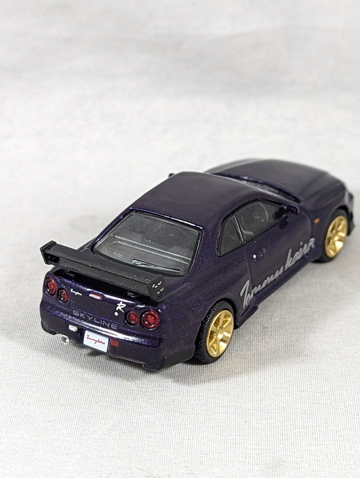 Mini GT Nissan Skyline GT-R R34 Tommykaira R-z Midnight Purple