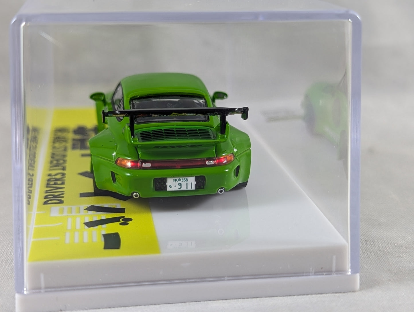 Tarmac Works RWB 993 Rough Rhythm Fuel Fest Student Driver Sealed