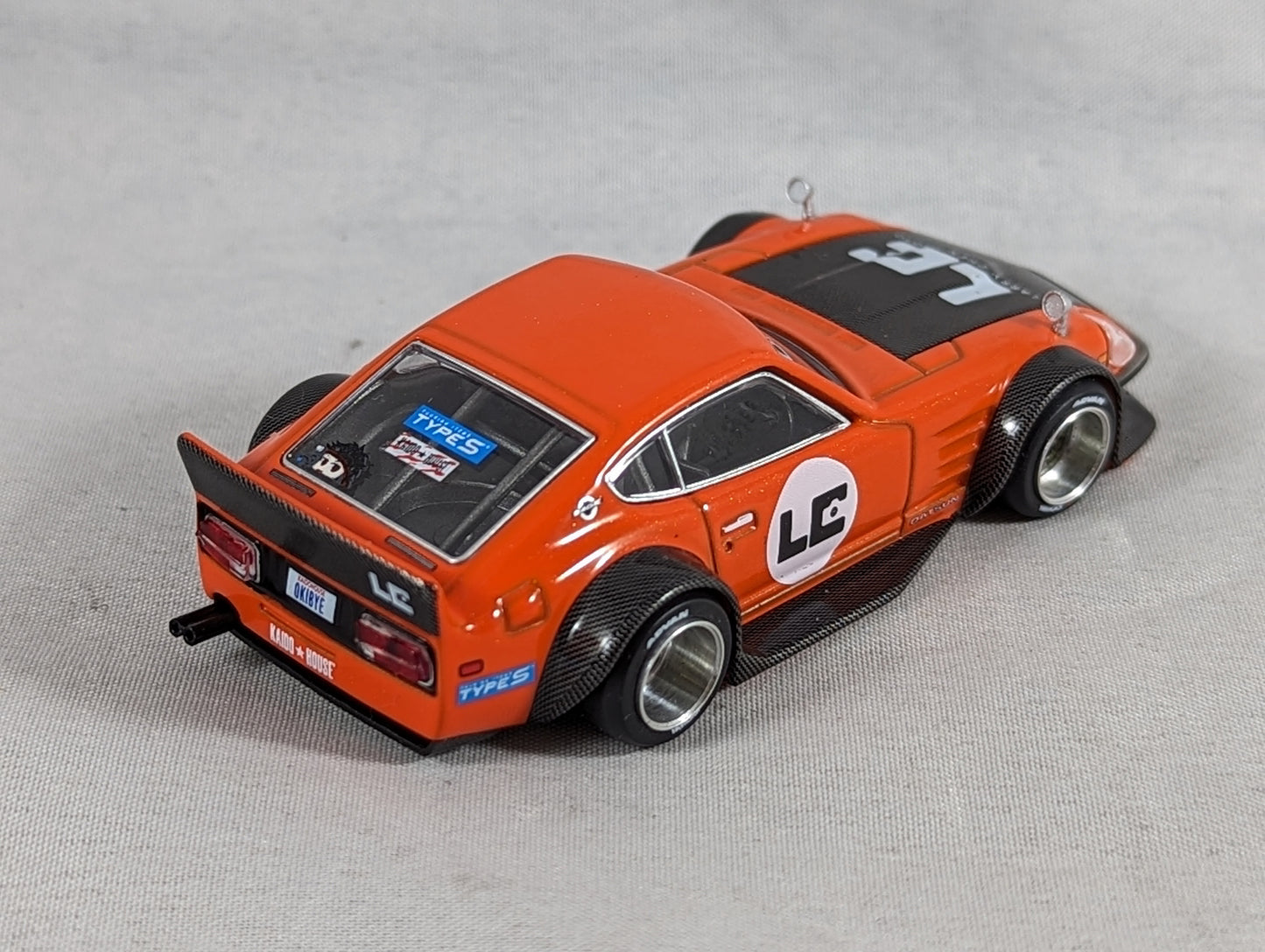 Kaido House Mini GT Nissan Fairlady Z 'Orange bang' Larry Chen V1 #100 Sealed