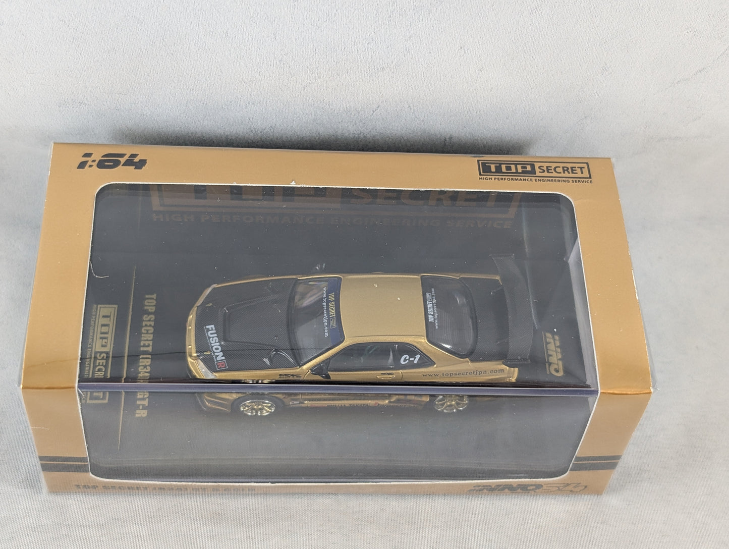 INNO64 Nissan Skyline GTR R34 Top Secret Gold